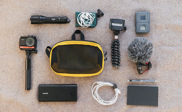 a Snake Charmer in Solaris with microphone and video equipment.